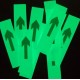 Photoluminescent adhesive arrows in bulk