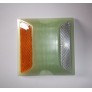 PHOTOLUMINESCENT & RETROREFLECTIVE ROAD STUDS